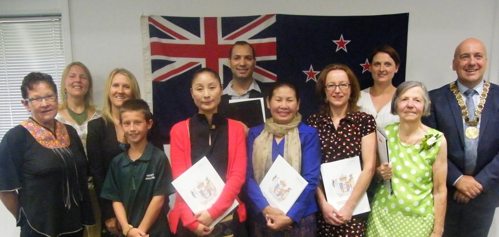 New citizens (from left) Rosalind Innes, Pernilla Landstrom, Rosemary Davies, Jamie Pope, Ling...