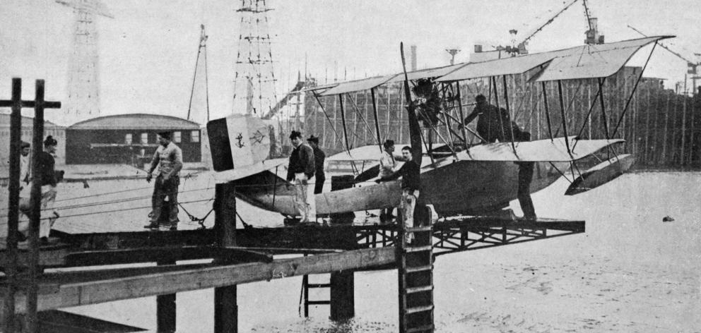 An ingenious landing stage for seaplanes at Dunkirk. The iron carriage is lowered beneath the...