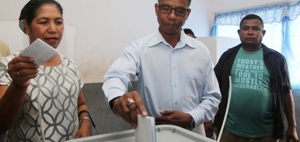 East Timor presidential candidate Antonio da Conceicao from the Democratic Party casts his ballot during the presidential election in Dili. Photo: Reuters