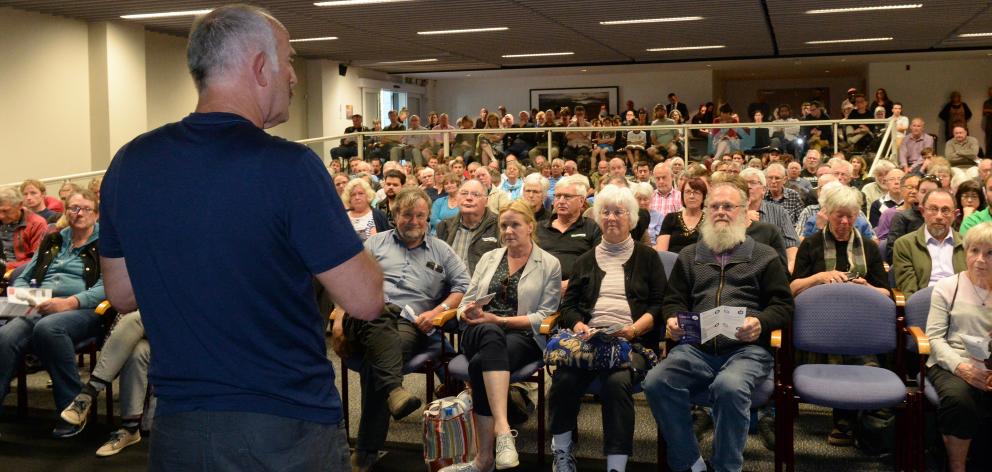 Gareth Morgan speaks to a packed audience at the Otago Museum's Hutton Theatre last night. Photo by Linda Robertson.