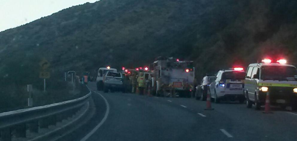 Emergency services attend a crash in Kawarau Gorge after a car hit a wall on the Gibbston Highway. Photo: Supplied