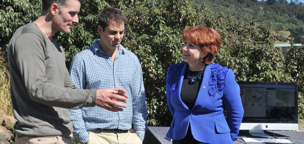 Conservation Minister Maggie Barry talks to Tussock Innovation’s Jesse Teat (left) and Mark...