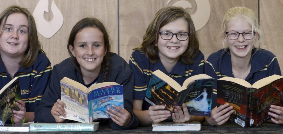 Otago Kids’ Lit Quiz runners-up, Tahuna Intermediate Team C pupils (from left) Millie Todd (11),...