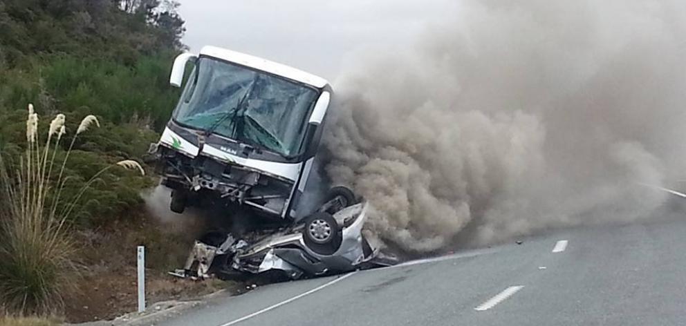 Two German tourists died when a bus crashed into a car on the Te Anau Milford Highway, 21st March 2017 Photo: Facebook/Jakob Frazer