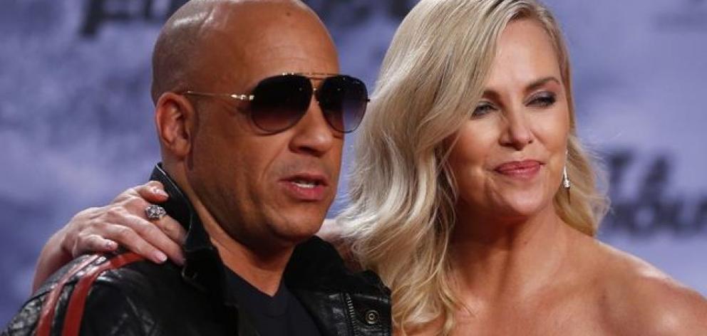 Actors Diesel and Theron pose at the premiere of "Fast and Furious 8" movie in Berlin. Photo: Reuters