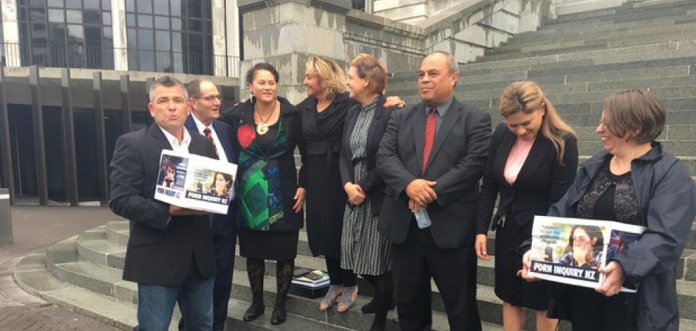Family First national director Bob McCroskie (left) presents a porn inquiry petition to MPs Chester Borrows, Louisa Wall, Marama Fox, Jan Logie, Aupito William Sio and Ria Bond. Photo/NZME