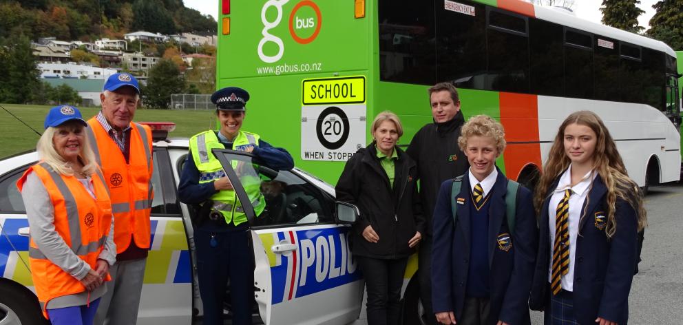 New signs have been installed on Go Bus' school bus fleet in Queenstown and Wanaka. Pictured with...