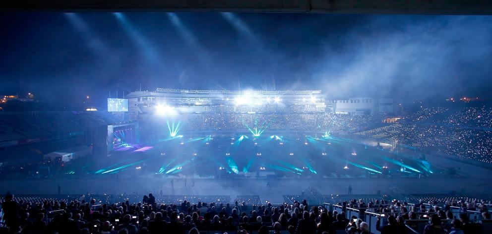 A laser light show opens the World Masters Games Opening Ceremony at Eden Park in Auckland. Photo: Getty Images