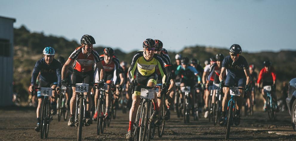 Paul Gough (No1) leads the pack out at the start of the cyclocross race at Beachlands Speedway on...