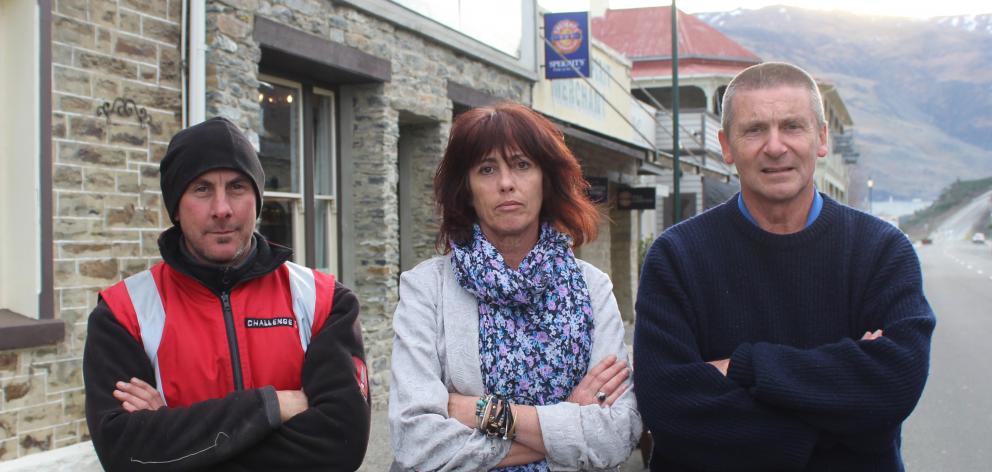 Challenge Dunstan Motors owner Jason Lines (left), Dunstan Hotel manager Robyn Gallagher and Vincent Community Board member Russell Garbutt are annoyed at the timing of Aurora's plans for a controlled power outage in Clyde on July 1. Photos: Jono Edwards
