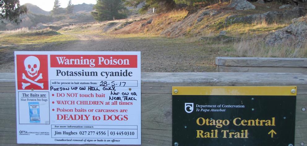 A sign along the Otago Central Rail Trail in Alexandra warns of a potassium cyanide poisoning...
