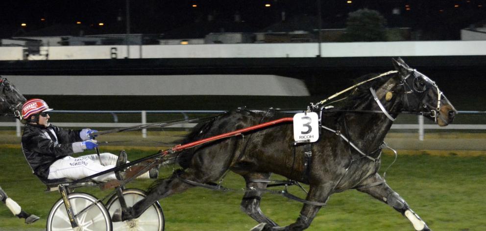 Driver Sam Payne has the David Pearce-trained All Nuts N Bolts in full flight before going on to...