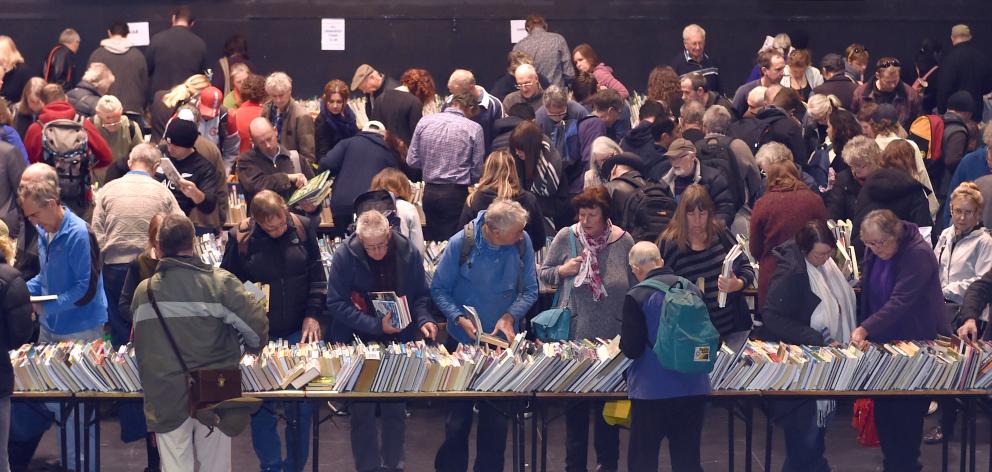 Enthusiasts search for books at the opening of the Star Regent 24-Hour Book Sale in Dunedin...