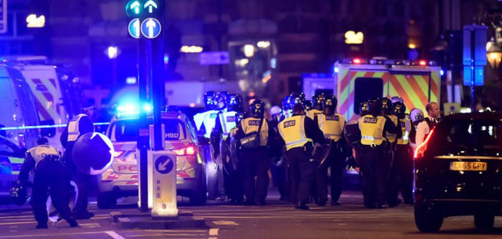 Police are rushing to London Bridge after several reports of a van running into pedestrians. Photo: Reuters