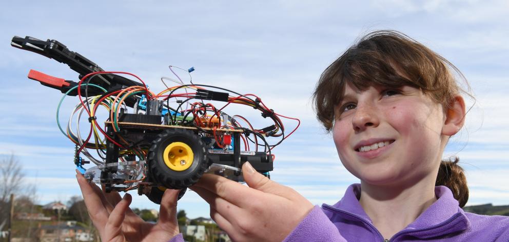Maia Robertson (13), of Columba College, with her robot named Armadillo. Photo: Gregor Richardson