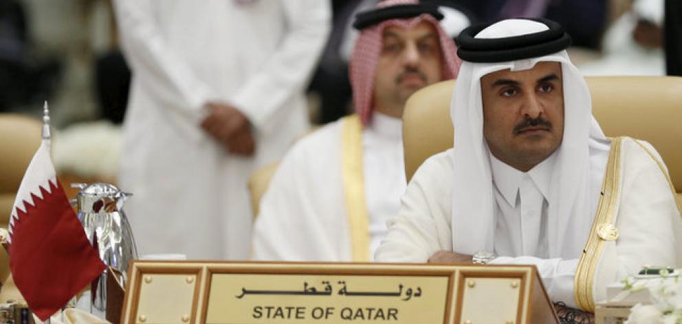 The Emir of Qatar Tamim bin Hamad al-Thani attends the final session of the South American-Arab Countries summit, in Riyadh. Photo: Reuters