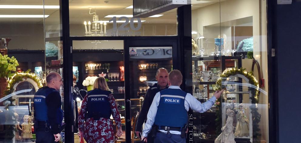 Police enter Sue Todd Antiques in Stuart St after an alleged robbery about 3.45pm yesterday....
