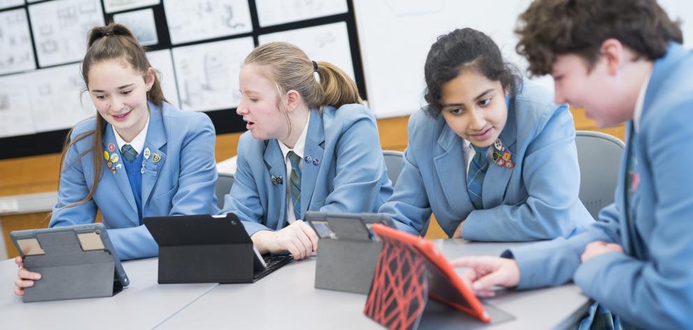 St Hilda's Collegiate pupils (from left) Tyla Giles (Year 10), Bella Devereux (Year 10), Shreya Das (year 9) and Meg Rogers (Year 9) are looking forward to next week's IT mentoring session at Otago Polytechnic. PHOTO: HAYDEN PARSONS