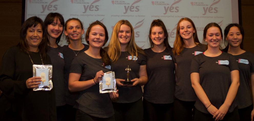 Young Enterprise chief excitement officer Terry Shubkin. Aekkarin Tippayaratprontawee (17), Callie Turner (16), Annabelle Alloo (17), Genevieve Walker-Radich (17), Anna McCaughan (17), Kimberley Barker (17), Lucy Beres (18), Claire Yang (17). PHOTO: PAUL Young Enterprise chief excitement officer Terry Shubkin. Aekkarin Tippayaratprontawee (17), Callie Turner (16), Annabelle Alloo (17), Genevieve Walker-Radich (17), Anna McCaughan (17), Kimberley Barker (17), Lucy Beres (18), Claire Yang (17). PHOTO: PAUL
