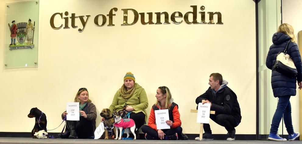 1080 opponents (from left) Michelle Hager with Bree, Samantha Luzzi with Rufus (left) and Maggie,...