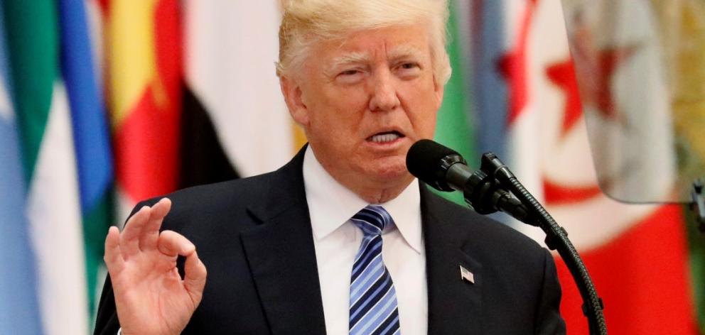 President Donald Trump delivers a speech during Arab-Islamic-American Summit in Riyadh, Saudi...