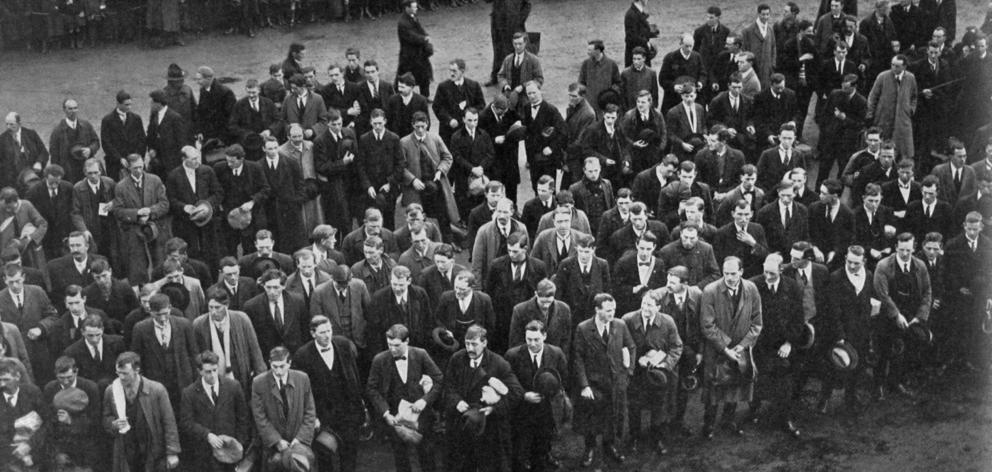 Men of the 31st Reinforcements listen to an address by the Mayor of Dunedin before entraining for camp in the North Island. - Otago Witness, 4.7.1917 