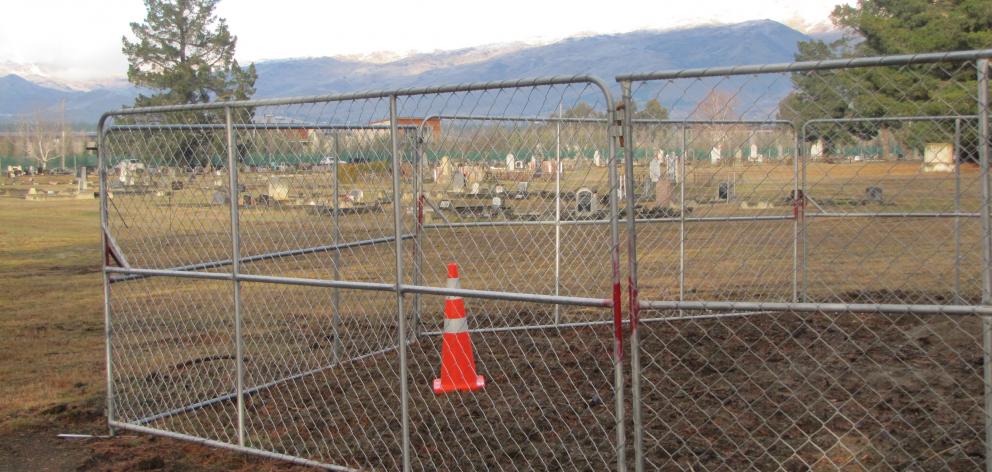 An area where human remains were found during the removal of a pine tree at Cromwell cemetery is...