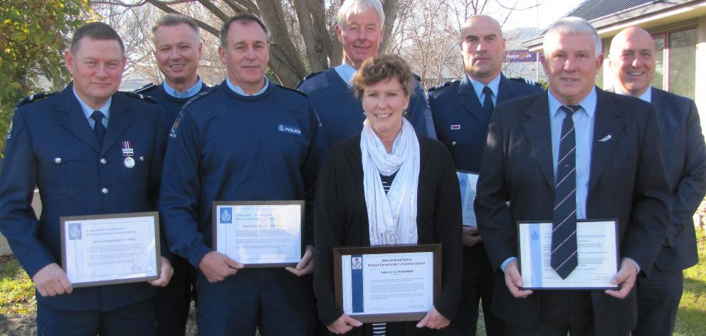 Celebrating after the presentation of commendations to six Central Otago police staff on...