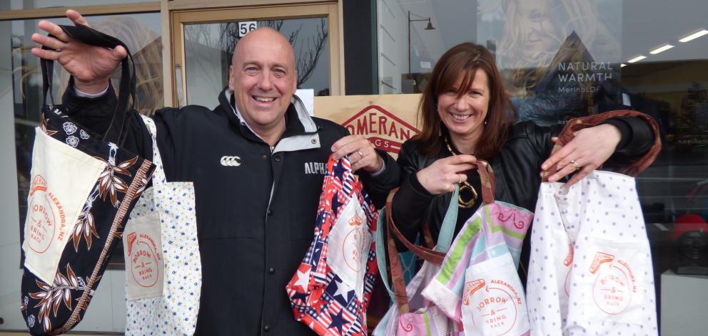Central Otago Mayor Tim Cadogan and Alexandra Boomerang Bags facilitator Amy Delport display some...