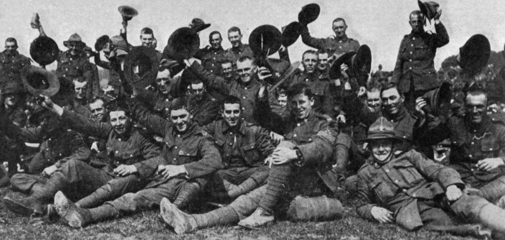 New Zealand troops stationed on the Salisbury Plain in England cheer the New Zealand Prime...