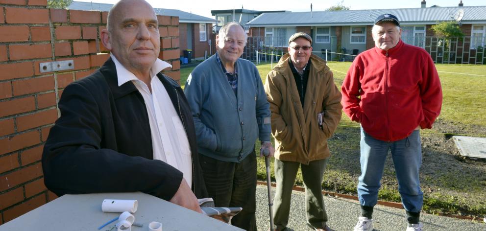 Dunedin City Council flat tenants (left to right) Robert Jamieson, Ian Robinson, Piers Heaney and...