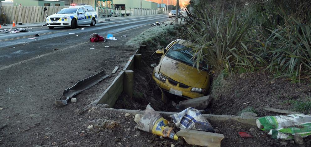 Police attend a fatal-crash scene in Waikouaiti late on Thursday. Photo: Stephen Jaquiery.