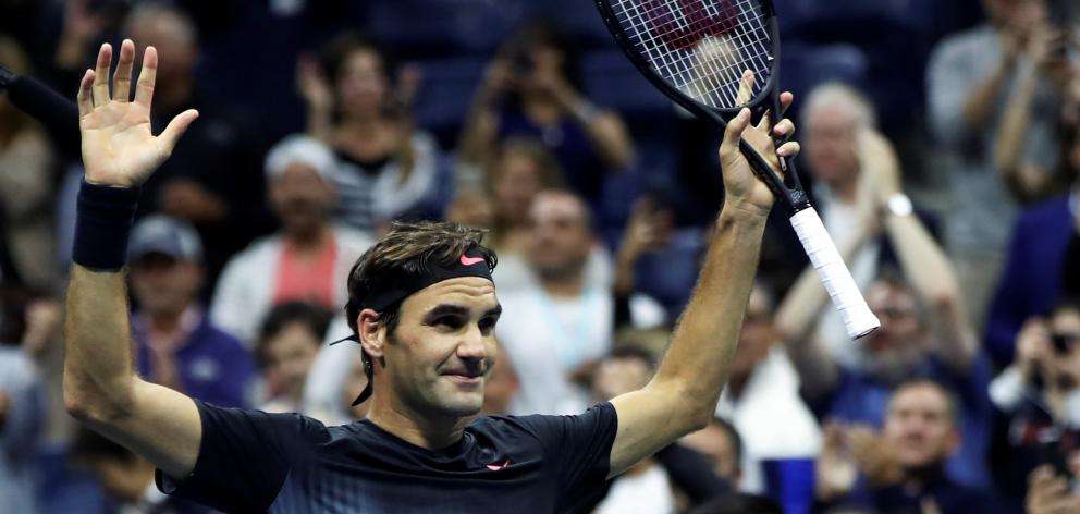 Roger Federer celebrates his win over Frances Tiafoe. Photo Reuters