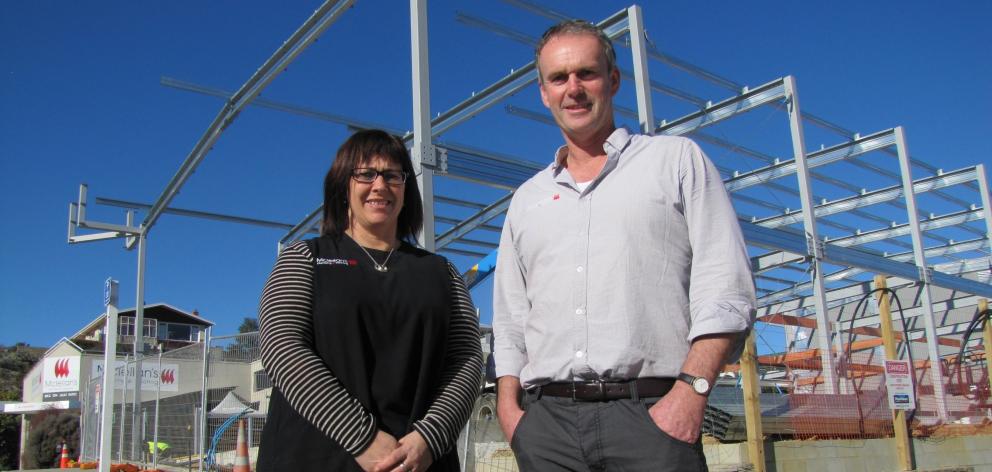 Karen and Rory McLellan in front of their new 900sqm showroom facility on the corner of Deel and...