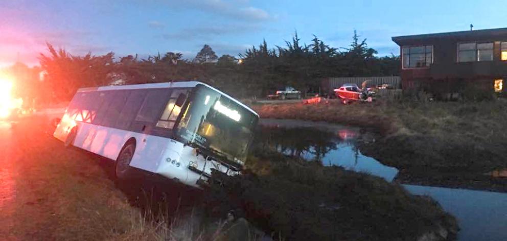 A Go Bus in a ditch in Karitane on Thursday. Photo: supplied.