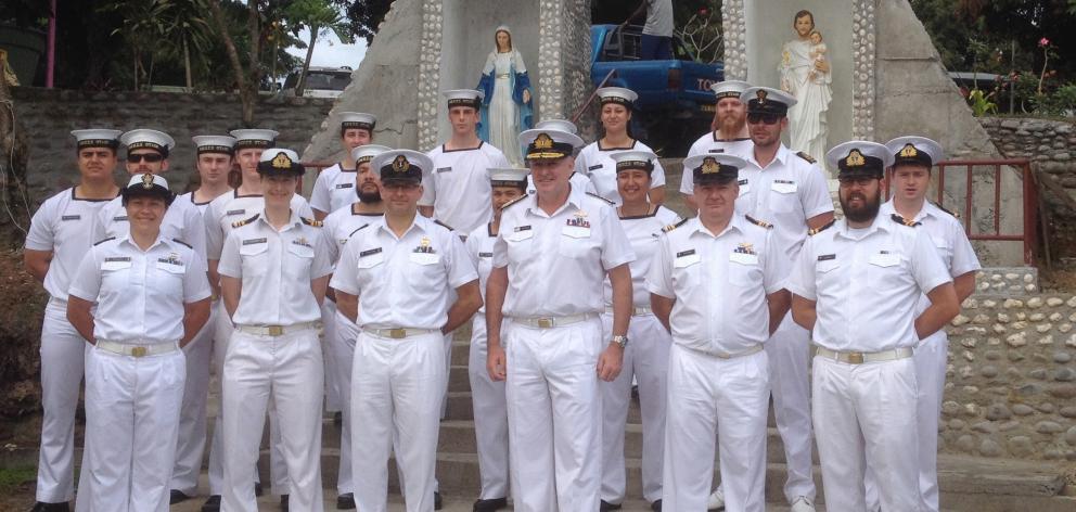 The crew of HMNZS Otago in the grounds of Honiara’s Holy Cross Cathedral before the service....
