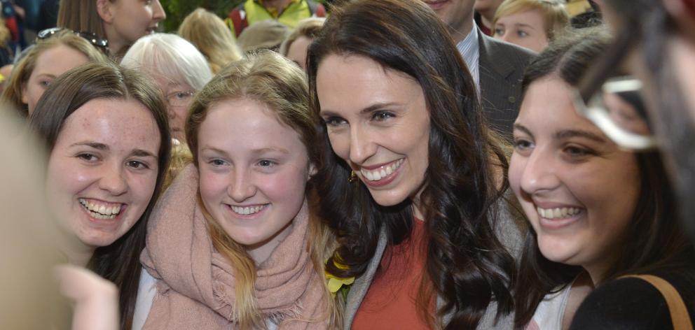 Dunedin students (from left) Olivia Cornille, Lily Bentall and Renee Veysi grab a selfie with...