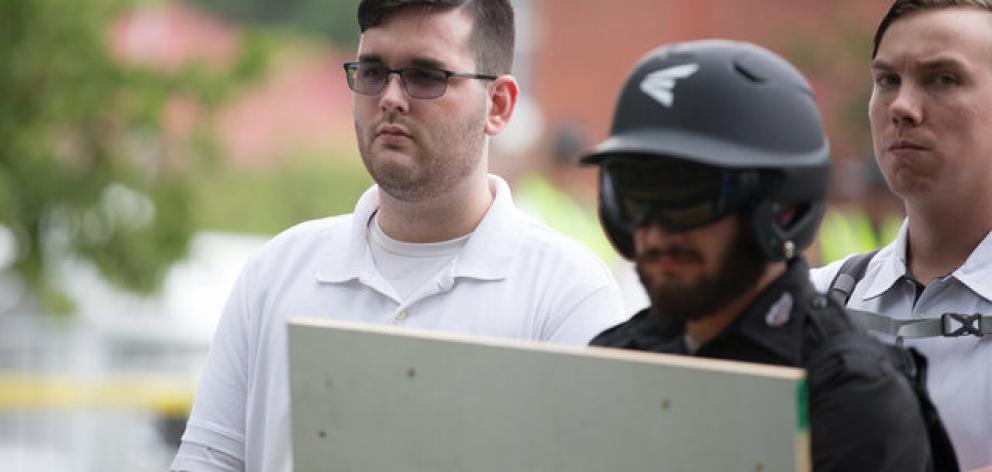 Police say James Alex Fields Jr (right) drove a car into a crowd of counter-protesters in Charlottesville, killing a woman and injuring several others. Photo: Reuters