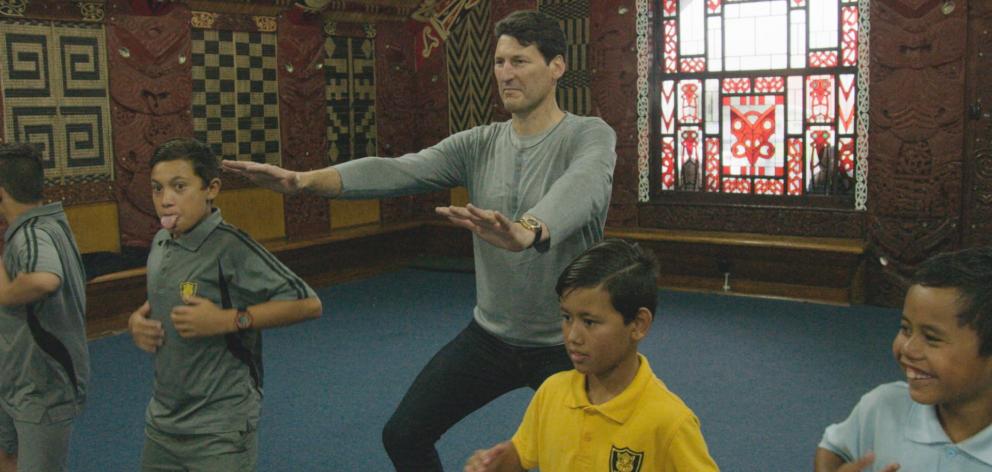 Former Wallaby captain John Eales learns a haka as part of the documentary 'John Eales Reveals: The Haka'. Eales described the experience as ‘‘very uncomfortable’’. Photo: Supplied
