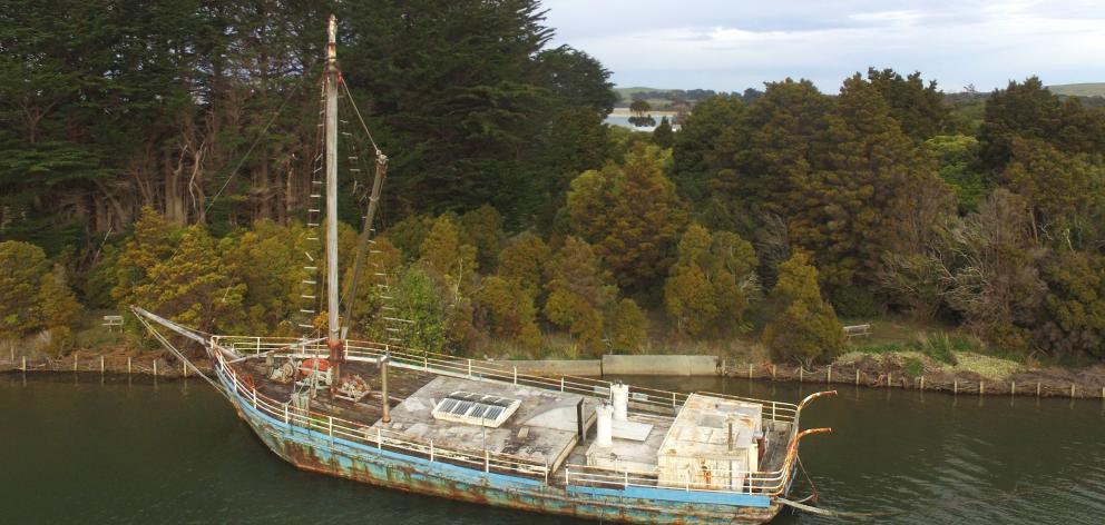 The Portland, beached on the Owaka River. Photo: Samuel White.