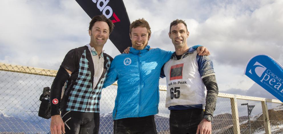Peak to Peak winner Hamish Fleming is flanked by second-placed Eryn Cutler (left) and third...