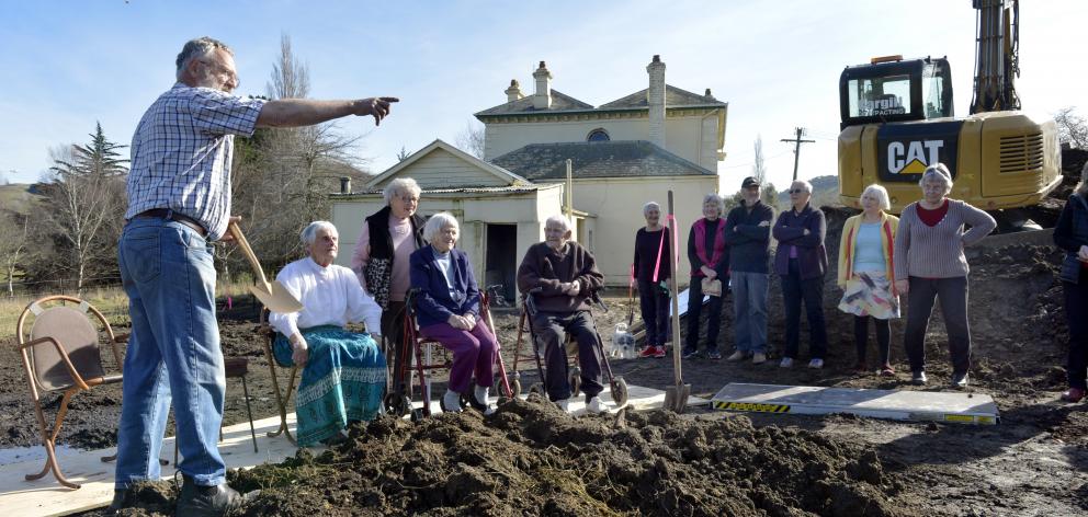 Waikouaiti Museum Society president Bill Lang celebrates the start of work on the new museum foundations with Mary Brockbank (86), June Rapson (89), Hazel (96) and Allan (99) Hagan, and other Waikouaiti residents at the museum site, behind the current mus