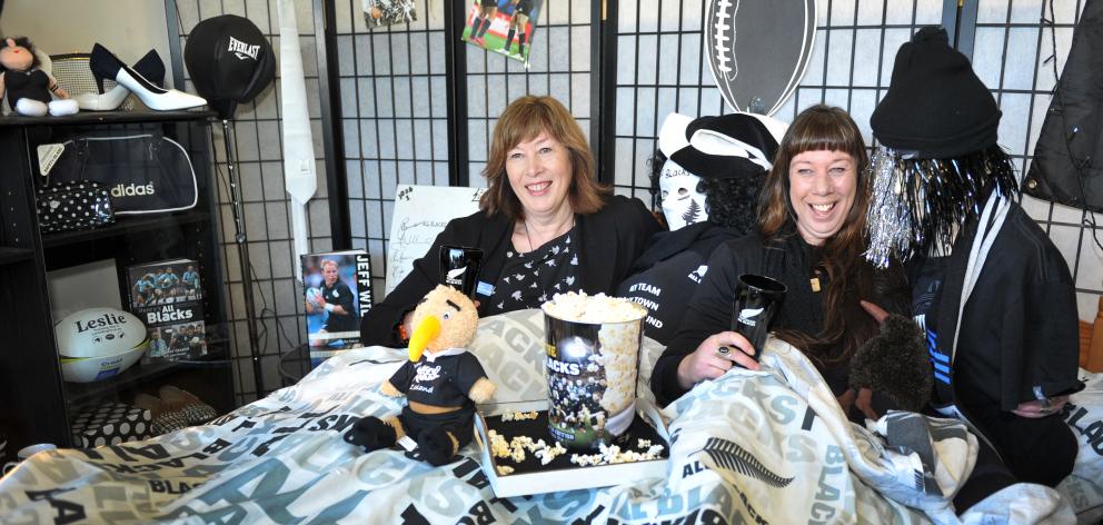 Mosgiel Salvation Army Family Store manager Fiona Smaill (left) and staff member Jodelle Young with their winning window display. Photo: Peter McIntosh