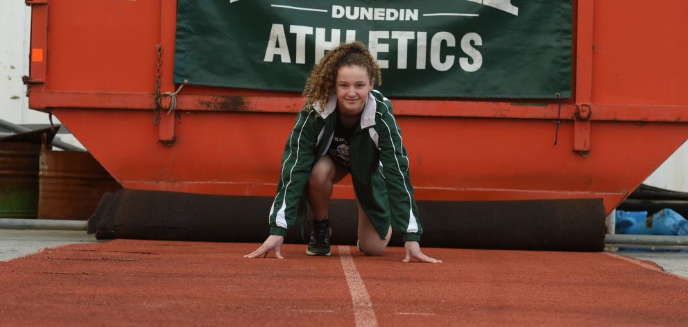 Ariki athlete Sarah Langsbury tries out the old Caledonian racing track at a construction yard in...