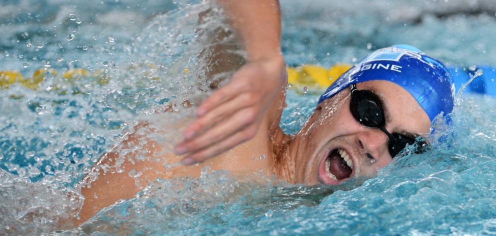 Courtland Ellis (Neptune) competes in a Men 13 and over 200m freestyle heat during the Otago...