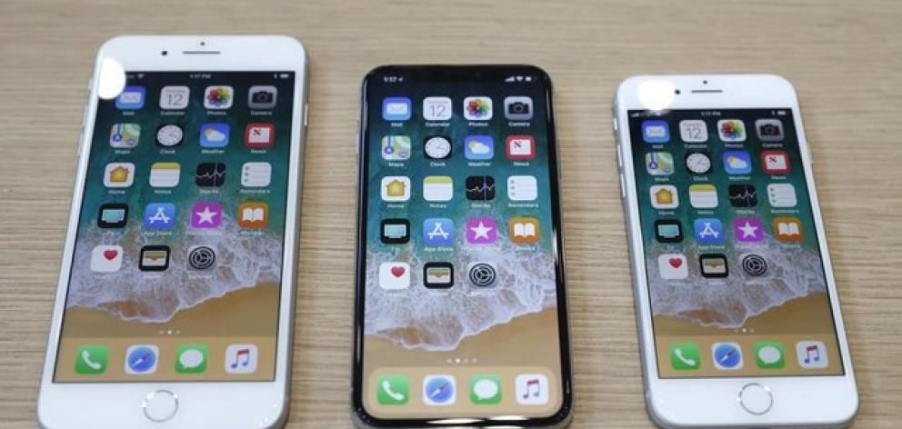 iPhone 8 Plus, iPhone X and iPhone 8 models are displayed during an Apple launch event in Cupertino. Photo: Reuters