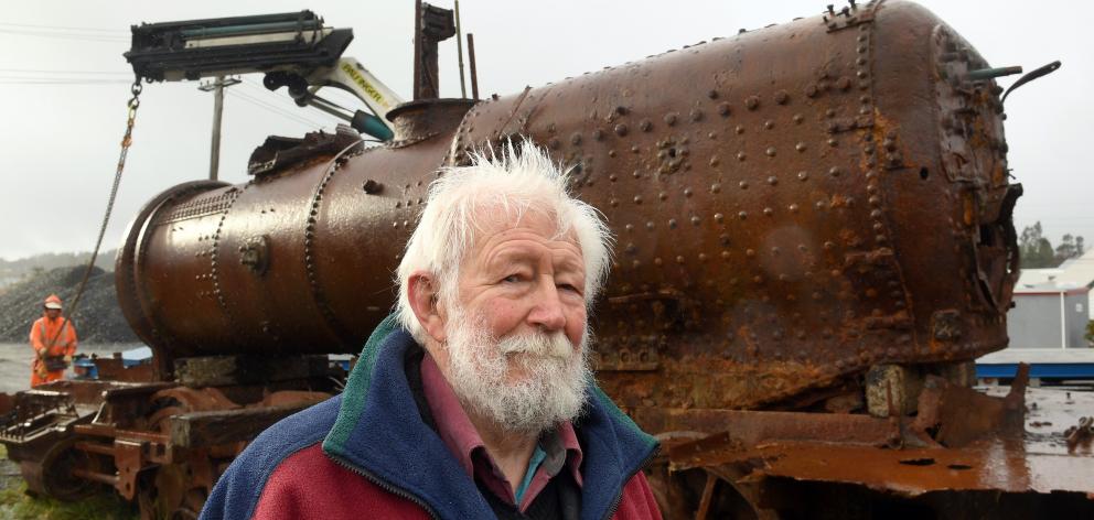 Project Steam chairman John Sutherland with the P class steam locomotive P133 at the KiwiRail yard in Mosgiel. Photo: Stephen Jaquiery