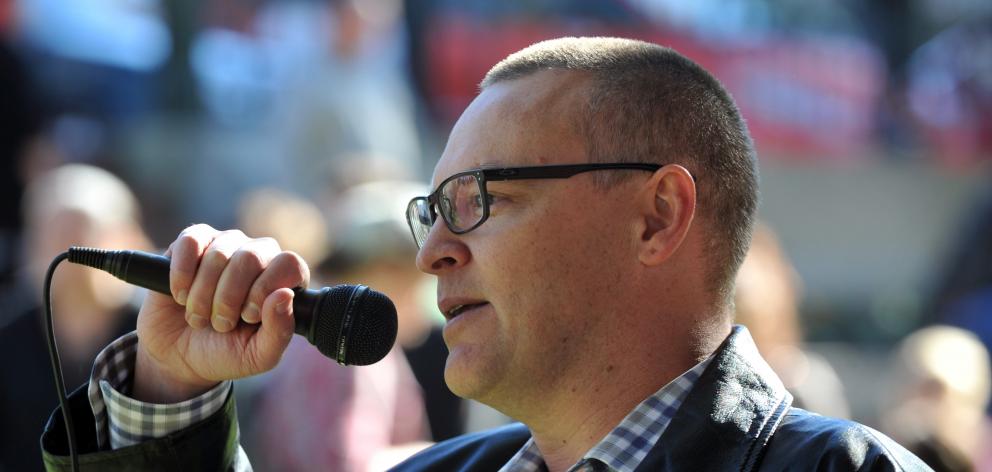 Dunedin North MP David Clark speaks to a crowd in the Octagon protesting the outsourcing of SDHB...