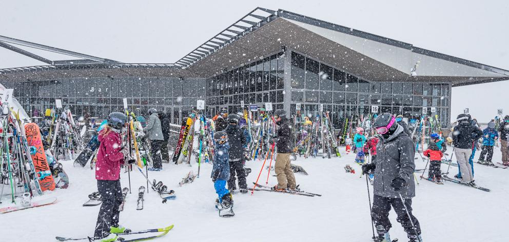 Hardy skiers at the base building of Queenstown skifield Coronet Peak on Saturday. Photo: Coronet...