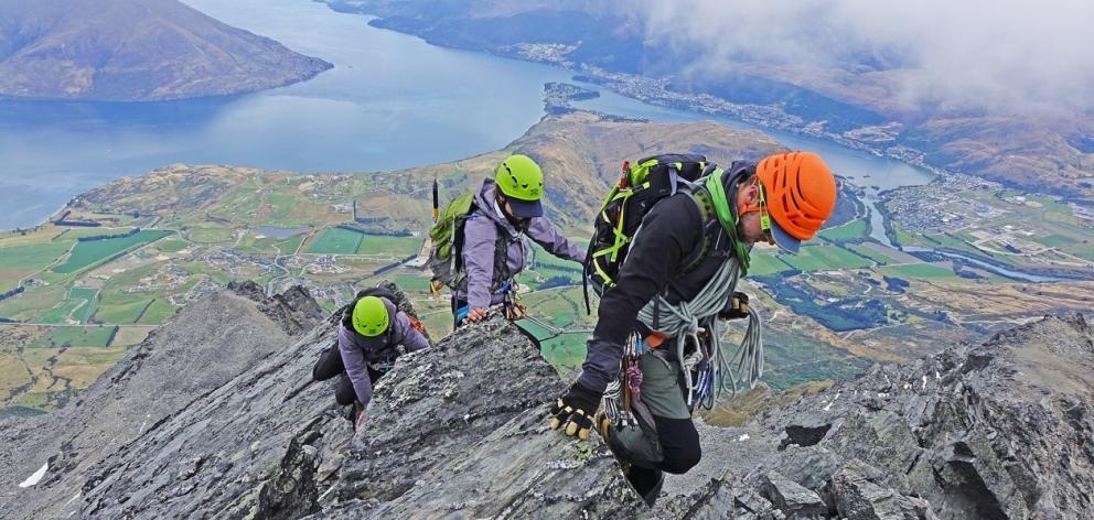 Kingston's Cameron Walker guides climbers on the Remarkables mountain range. 